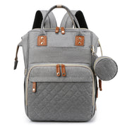 NestGo backpack interior compartments organized with baby items