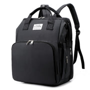 CarryAll tote worn as backpack by new mother on outing